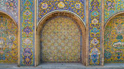Colorful painting mosaic tiles on the wall at Golestan palace, Tehran, Iran