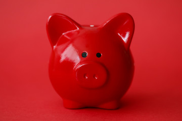 Red piggy box background. Fast banking credit money concept