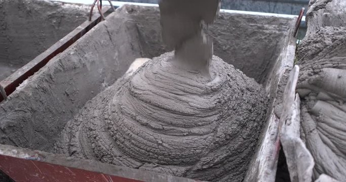A lot of mortar for laying brick was brought to construction site it is unloaded