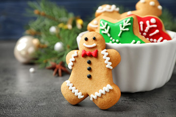 Tasty homemade Christmas cookies on grey table, closeup view