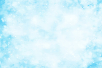 Artistic light blue watercolor background with stains