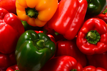Fresh red, green, yellow bell pepper background.