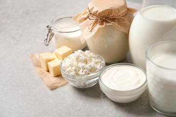 Different delicious dairy products on light table