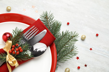 Christmas table setting on white background, closeup
