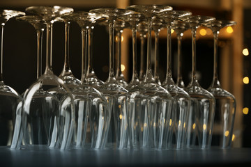 Empty clean glasses on counter in bar