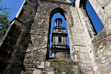 Tower of the Aegidienkirche in Hanover through bombed window