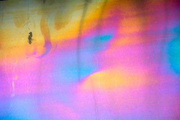Colored stains on iron surface. The interference of light. Background