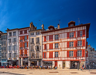 Colorful houses at the Nive river embankment in Bayonne, France