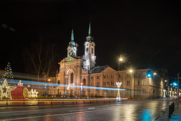 Fototapeta premium Front view of the baroque church at night. Warsaw, Poland.