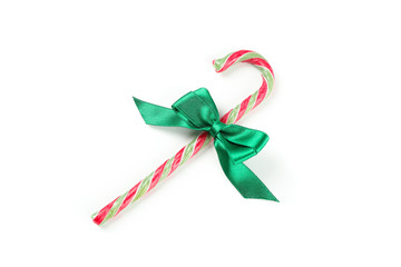 Sweet candy cane with bow isolated on white background