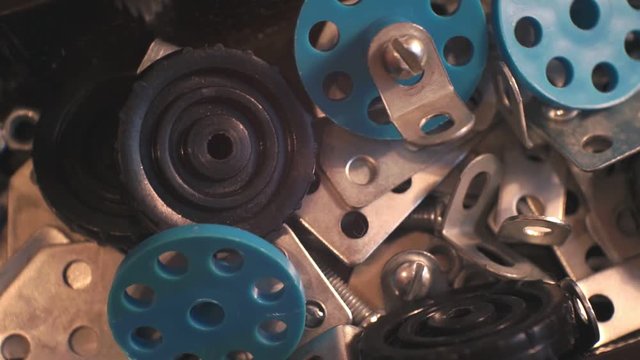 set of various metal mechanical elements of different shapes in a box.close-up.top view.