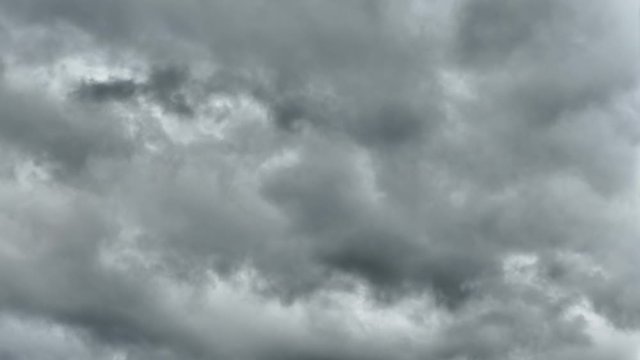Hurricane approaching. Black and gray clouds fly fast across the sky. The beginning of a storm and thunderstorm.