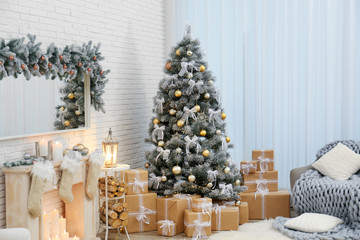 Decorated Christmas tree in modern living room interior