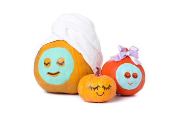 Funny pumpkins isolated on white background. Body care