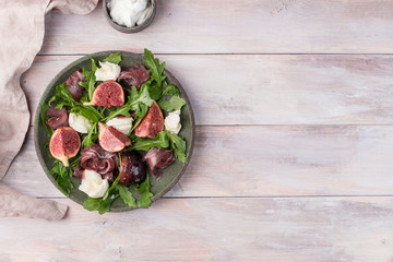 Marinated figs with mozzarella and serrano ham