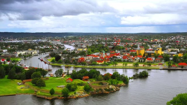 Fredrikstad, Norway. Aerial view of Glomma river in Fredrikstad, Norway with famous landmarks like Isegran Fort during a cloudy summer day, zoom out