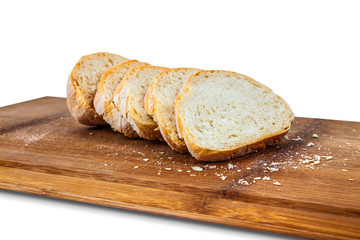 Close-up photo of a slices of bread on a bamboo board.