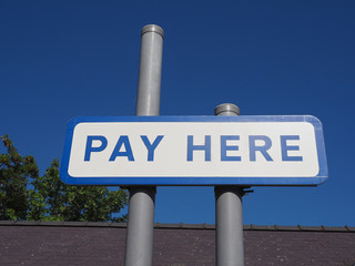 pay here parking sign