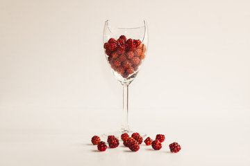 Glass with many red mulberry
