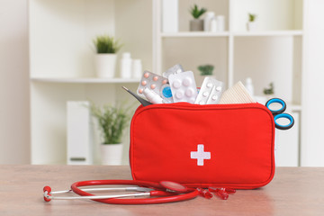 First aid kit on table in clinic