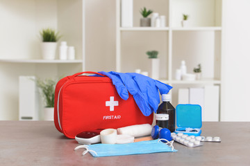 First aid kit on table in clinic