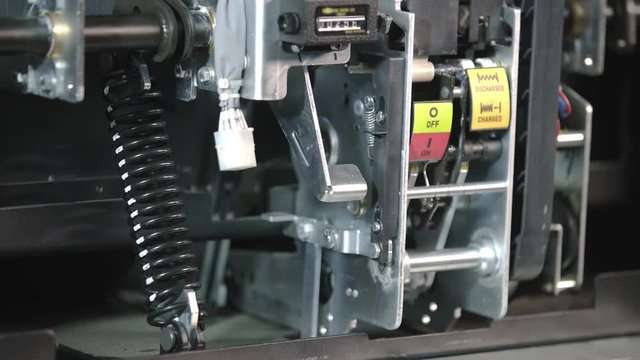 Circuit breaker high voltage discharged. Electrical Contact Switch. Part of high-voltage substation with switches and disconnectors. Inside shot of electical installation