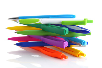 Multicolored ball point pens isolated on white background