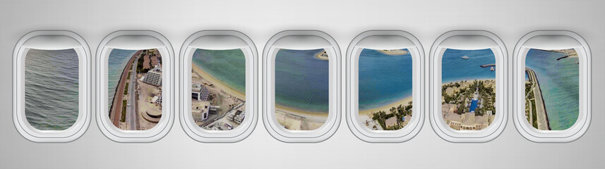 Fototapeta premium Airplane interior with window view of Dubai Pam Jumeirah Island, UAE. Concept of travel and air transportation