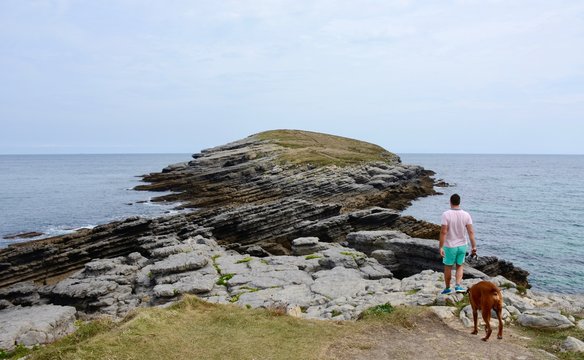 Young male walking on the island
