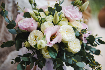 Wedding Bridal Bouquet. Bridal bouquet of white and pink colors. Bride with bouquet, closeup