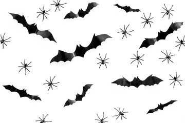 Stylish Halloween design. Bats and spiders on white background top view pattern