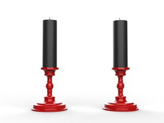 Two black wax candle on red candle holders