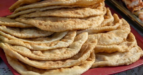 Caucasian cuisine chebureks meat in rustic style.