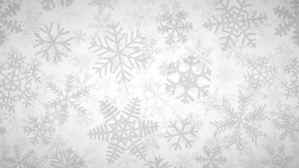 Christmas background of many layers of snowflakes of different shapes, sizes and transparency. Gray on white