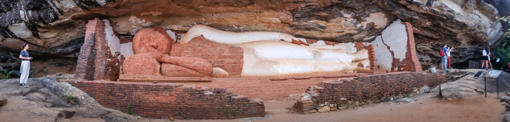 Sleeping Buddhism statue at the Pidurangala mountain. Sigiriya Sri Lanka.