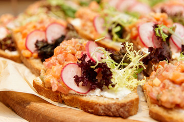 Bruschettas with chopped salmon fillet