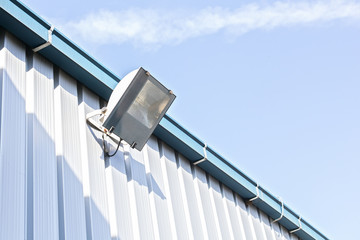 security flood lights on wall during day time