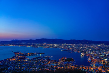 Night view from Mt. Hakodate observation deck, the expansive vista light up in evening is spectacular. A famous three star rating sightseeing spot in Hakodate City, Hokkaido, Japan