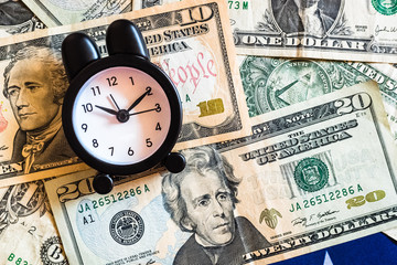 This alarm clock with the words recession on US dollar bills warns of future crises.