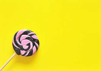 Delicious candies on colorful background.
