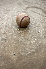 A baseball on a school playground.