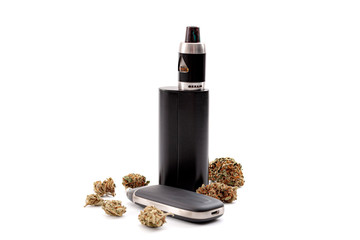 CBD and THC vaping products, dry herb vaporizer and healthy inhaling of cannabis concept theme with...