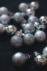 Close up of silver and glitter Christmas baubles
