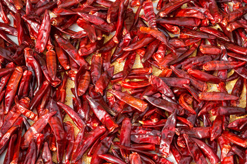 Red pepper being dried.