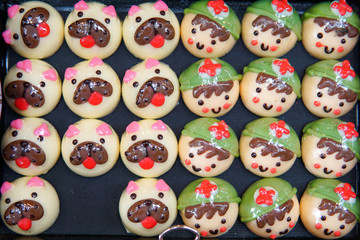 Chocolates in different shapes and sizes sold in open food market.