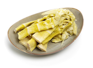 dried bamboo shoot on white background 