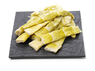 dried bamboo shoot on white background 