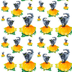A black cat with green eyes stands on a huge pumpkin on Halloween. Watercolor illustration isolated on white background.Seamless pattern