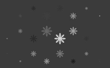 Light Silver, Gray vector template with ice snowflakes. Decorative shining illustration with snow on abstract template. The pattern can be used for new year leaflets.