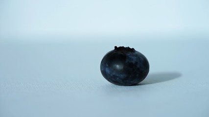 side view on blueberry on blurred background